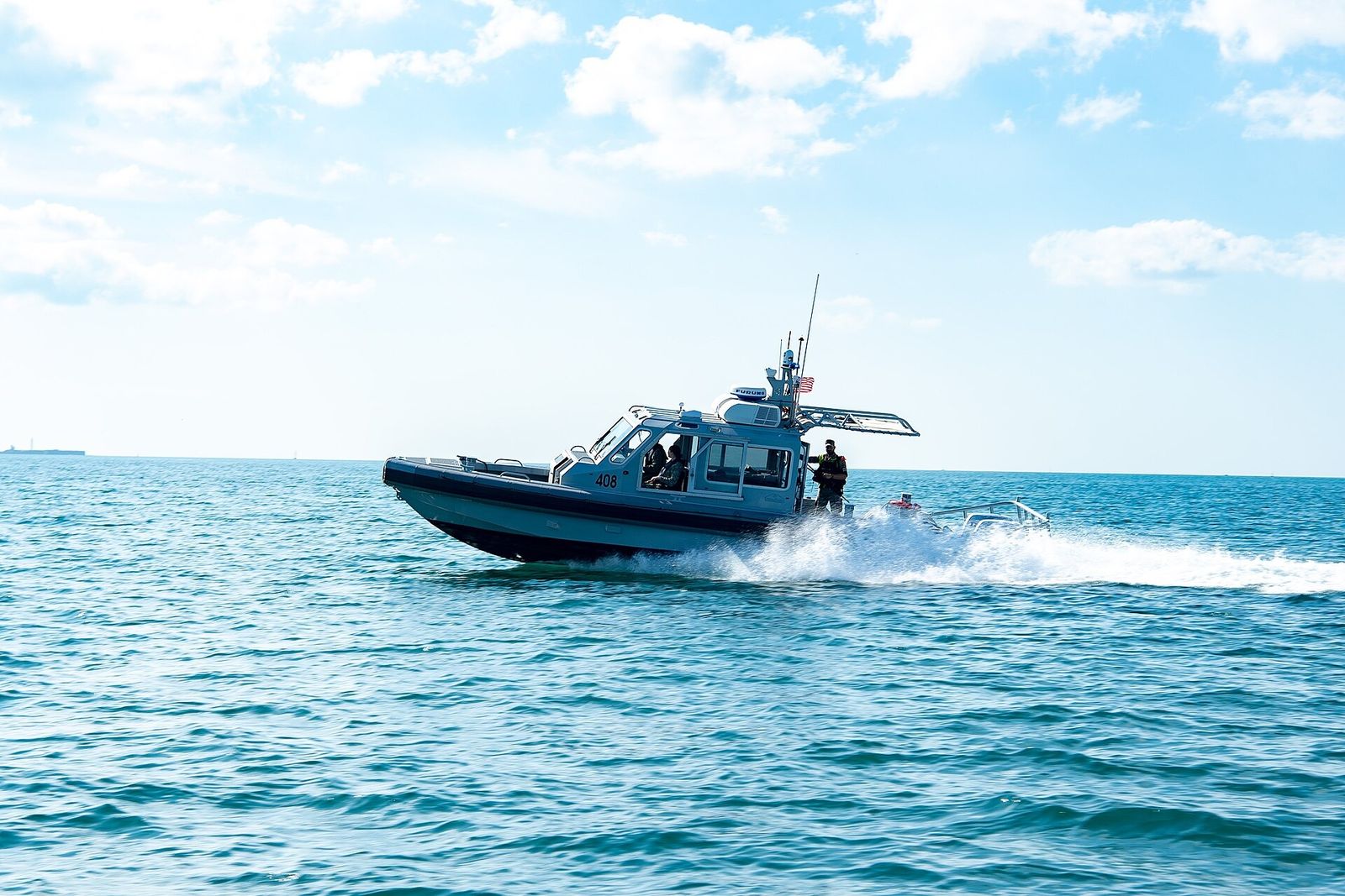 A harbour patrol boat during high-speed manoeuvre training at Rota, Spain